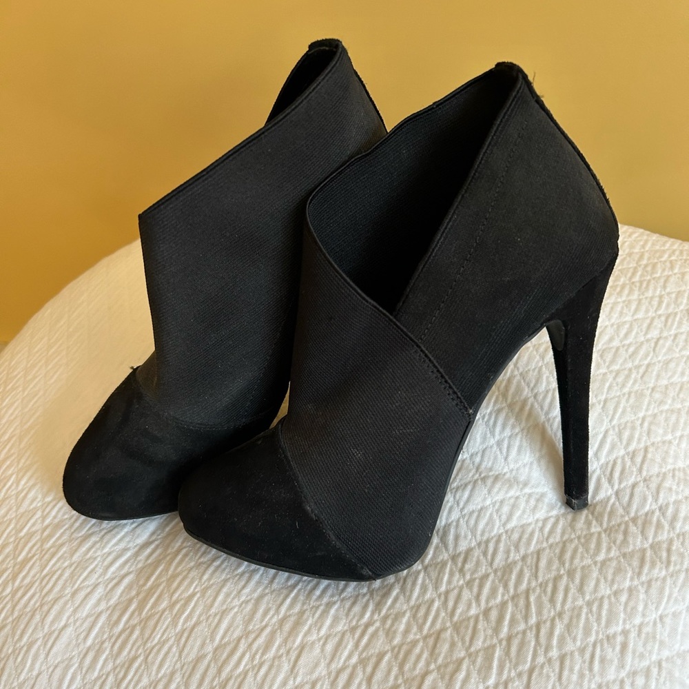 Adorable high heel booties. Lightly worn
